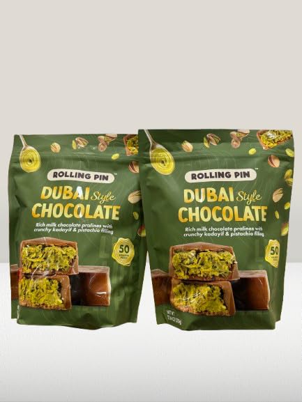 Dubai Style Chocolate Pistachio Pralines – Pack of 2 | Product of Belgium | 100 Wrapped Pieces | Rich Milk Chocolate with Crunchy Kadayif &amp Pistachio Filling | 2 x 17.64 oz Gift Boxes