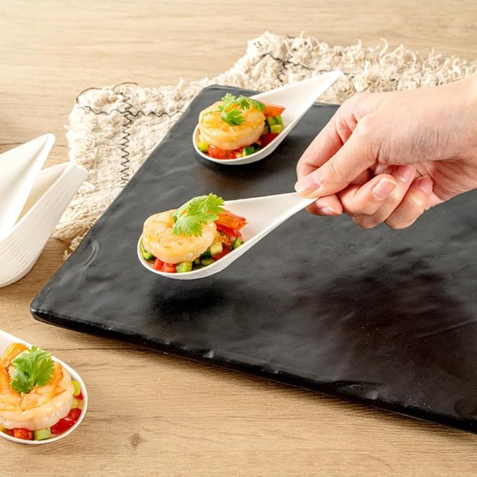 Restaurantware Tasting Spoons - 100 Pack - 4.25 Inch Pulp Safe Home Compostable Teardrop Mini Spoon - Eco-Friendly Sugarcane Bagasse Disposable Utensils for Catering Food Tasting