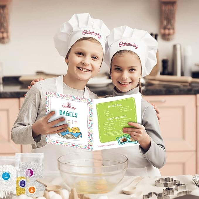 Baketivity Kids Baking Set Meal Cooking Party Supply Kit for Teens Real Fun Little Junior Chef Essential Kitchen Lessons Includes Pre-Measured Ingredients (Kit + Hat &amp Apron Bagels)