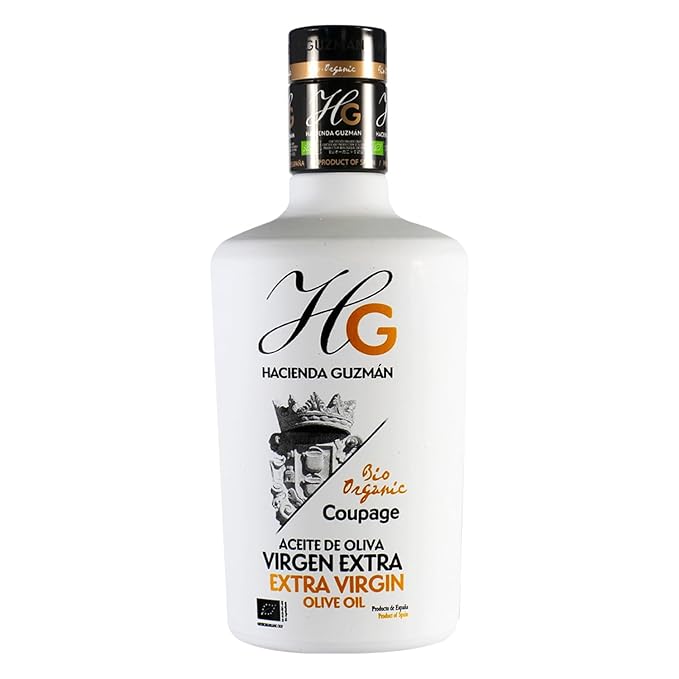 HACIENDA GUZMÁN - Extra Virgin Olive Oil Bio Mix of Manzanilla Hojiblanca and Arbequina Variety. Perfect for cooking baking and Salad Dressing. Available in 16.9 FL OZ (500 mL) Bottle.