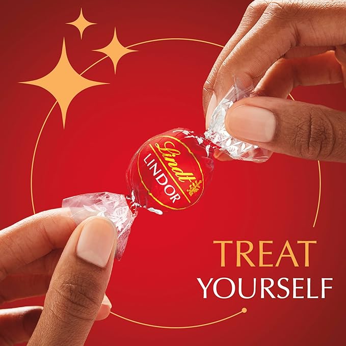 Lindt LINDOR Milk Chocolate Truffles 90 Count Gift Box Chocolate Candy with Smooth Melting Truffle Center 38 oz. Box