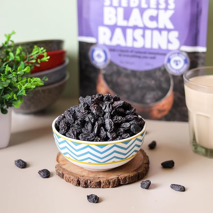 Urban Platter Seedless Black Raisins 500g