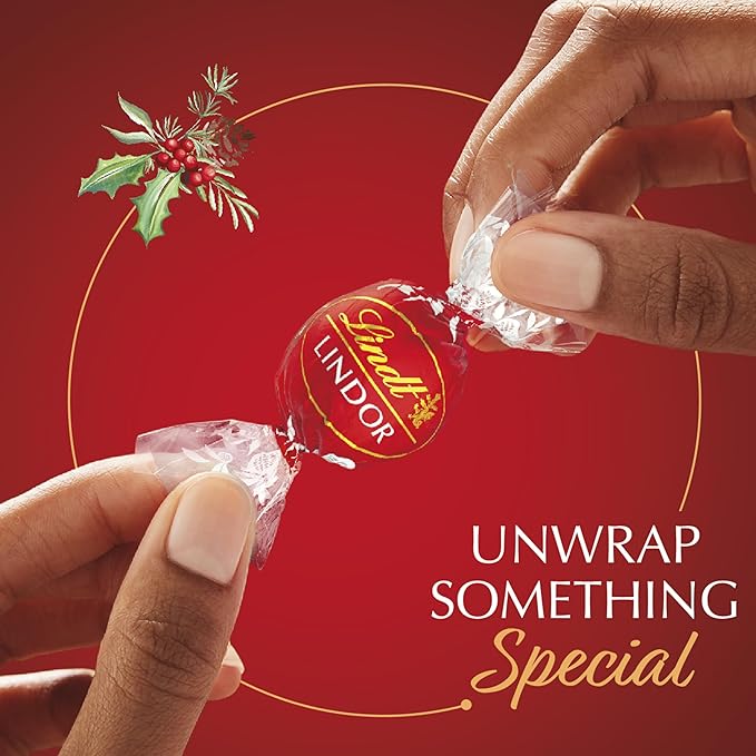 Lindt LINDOR Holiday Milk Chocolate Candy Truffles Wrapped Gift Box Milk Chocolate with Smooth Melting Truffle Center 10.1 oz.