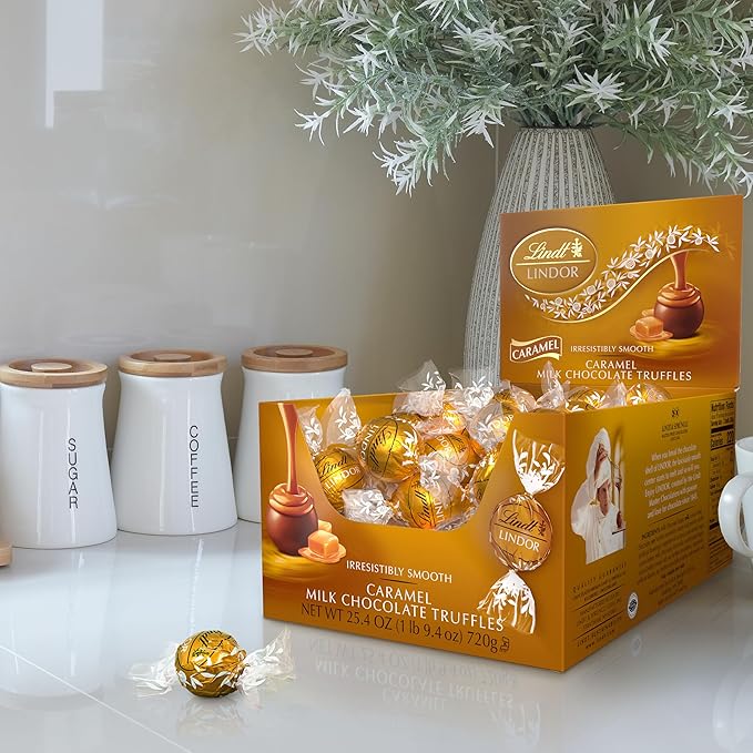 Lindt LINDOR Caramel Milk Chocolate Candy Truffles Milk Chocolate Candy with Smooth Melting Truffle Center 25.4 oz. 60 Count
