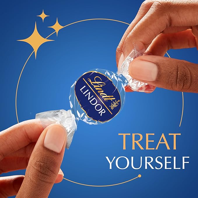 Lindt LINDOR Cookies and Creme White Chocolate Candy Truffles with Smooth Melting Truffle Center 25.4 oz. 60 Count