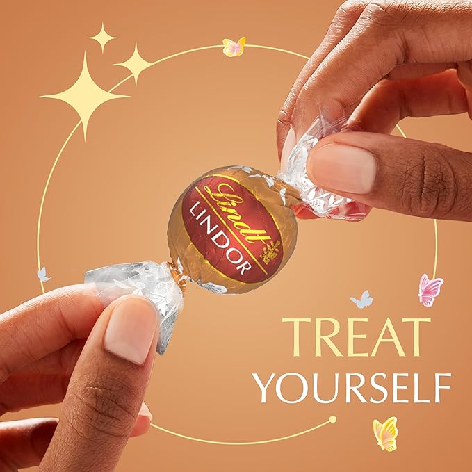 Lindt LINDOR Carrot Cake White Chocolate Candy Truffles White Chocolate With Carrot Cake Truffle Filling 19 oz. Bag