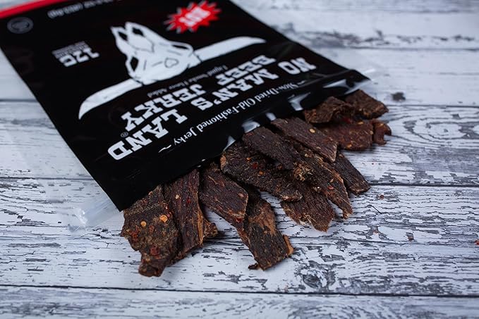 No Mans Land Premium Beef Jerky | 17G High Protein Slow-Dried Beef Snack | Smoked &amp Seasoned Jerky Strips | HOT 16oz Bag