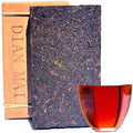 Yunnan Pu'er Tea Brick - Fermented Black Tea Since 2009 Organic Pu-erh 500g Package With Bamboo Leaves Traditional Method