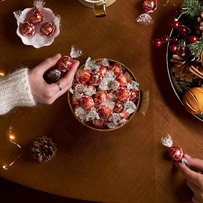 Lindt LINDOR Holiday Milk Chocolate Candy Truffles Wrapped Gift Box Milk Chocolate with Smooth Melting Truffle Center 10.1 oz.