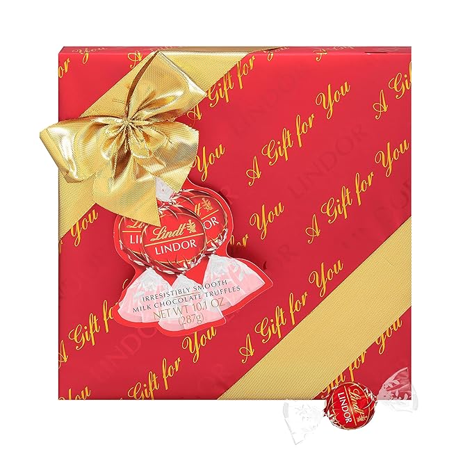 Lindt LINDOR Holiday Milk Chocolate Candy Truffles Wrapped Gift Box Milk Chocolate with Smooth Melting Truffle Center 10.1 oz.