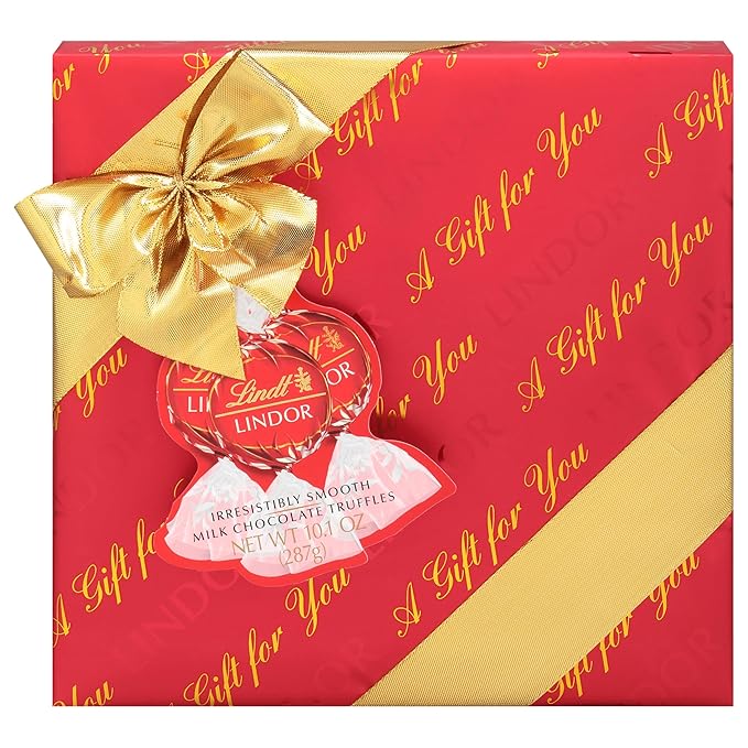 Lindt LINDOR Holiday Milk Chocolate Candy Truffles Wrapped Gift Box Milk Chocolate with Smooth Melting Truffle Center 10.1 oz.